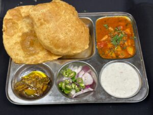 Chole Bhature & Aloo Poori at Salt N Pepper NC 2 Chole Bhature & Aloo Poori